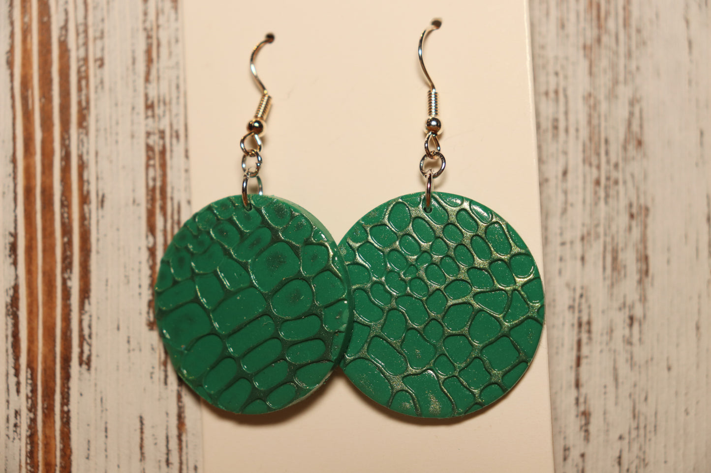 Green snake print earrings