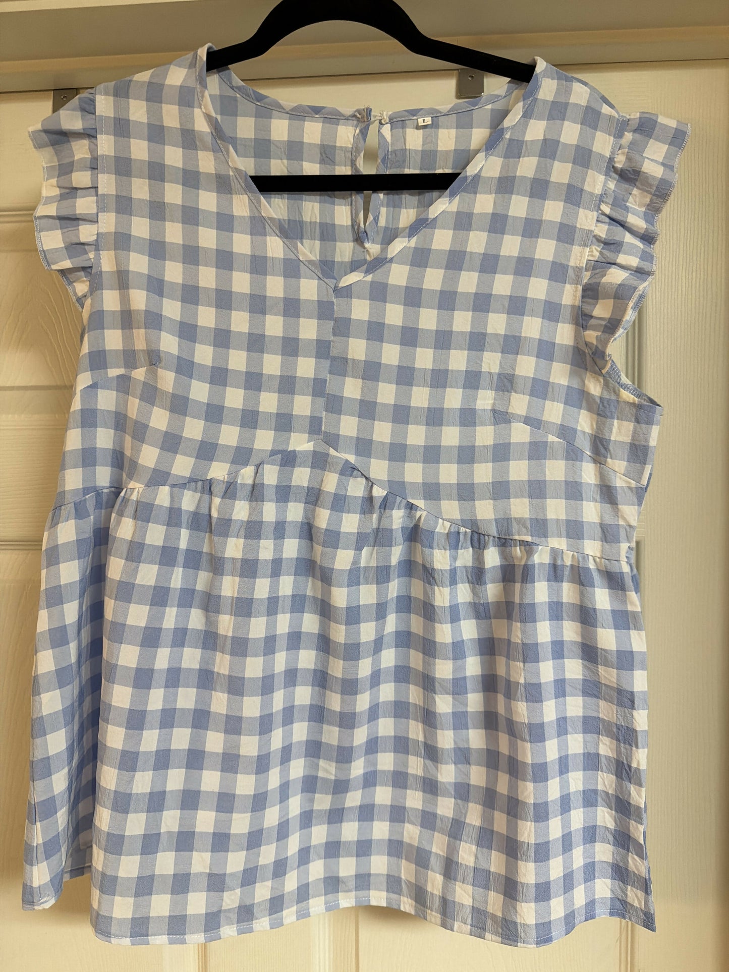 Sleeve less blue checkered shirt size Large