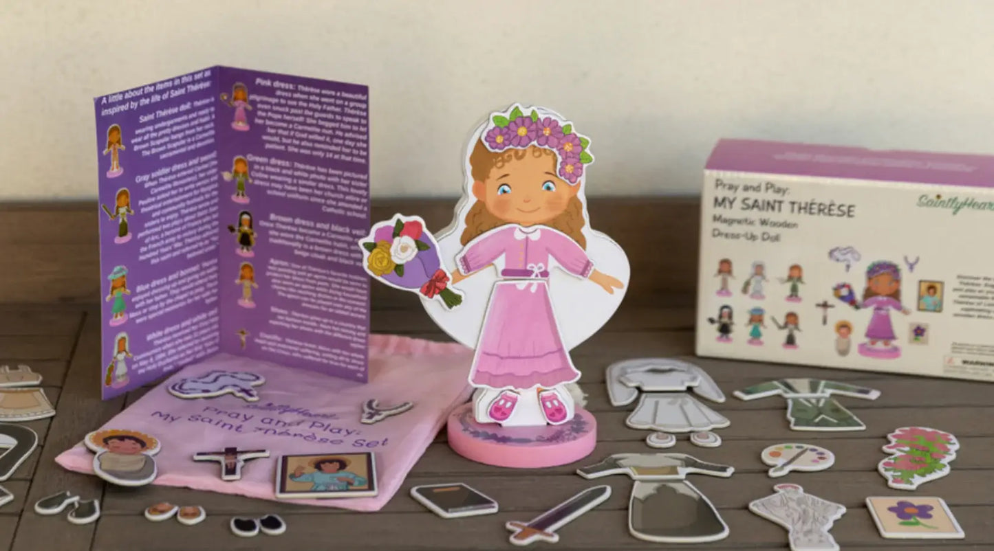 Saintly Heart LLC - My Saint Thérèse, A magnetic wooden dress-up doll set