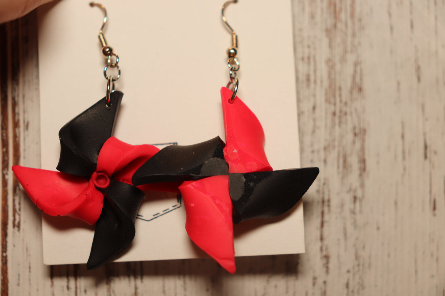 Pink and black pinwheel earrings