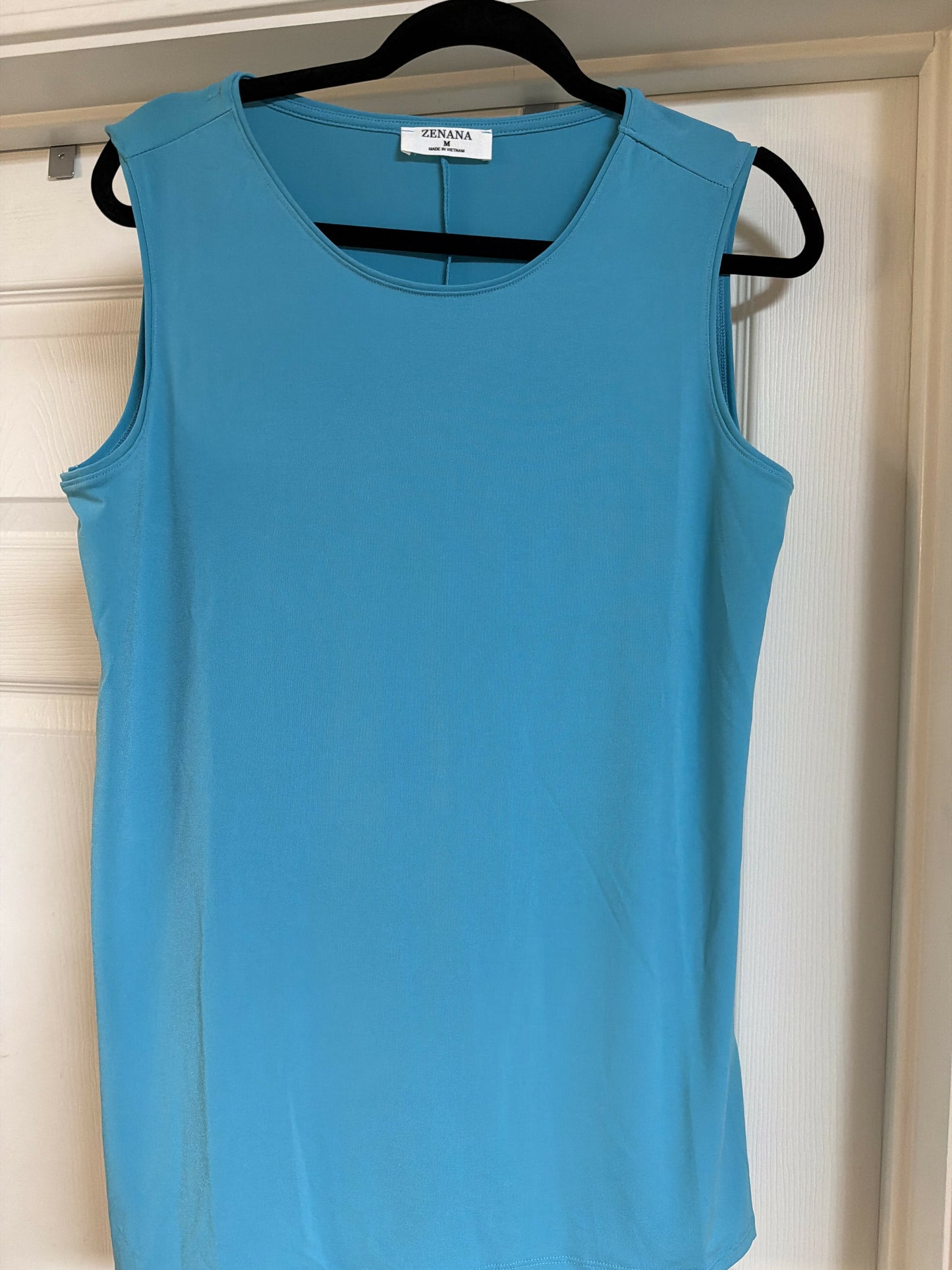 Tell blue tank size med