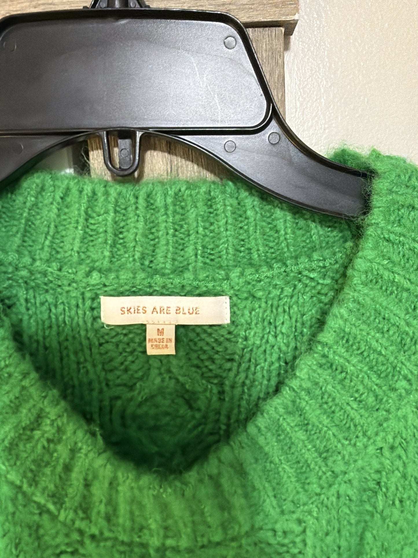 green sweater with pearls- size M