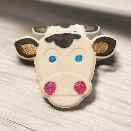 Hand Painted Cow Bath Bomb with surprise coin inside 